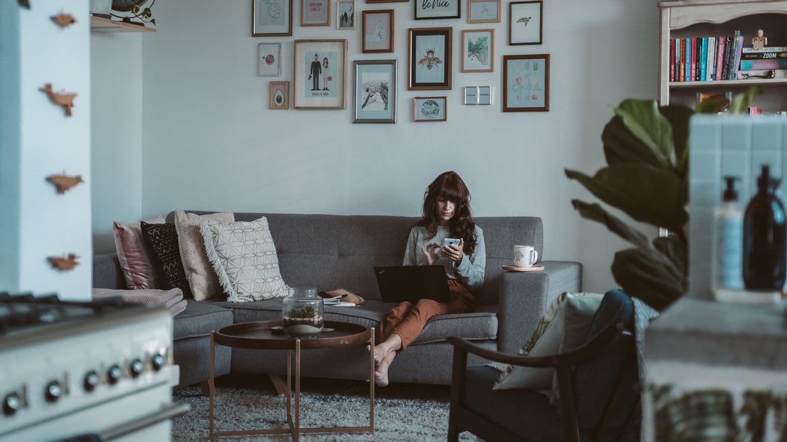 A customer arranging her day from a comfortable living room